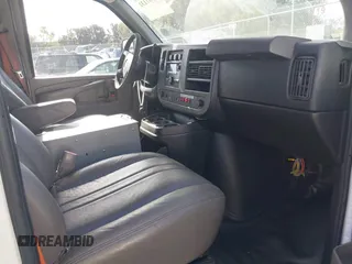 2014 Chevrolet Express Cargo Van with VIN 1GCWGFCB2E1122236, listed as a IAAI auction lot 41381131 with 70,696 mi miles. Bid and sale history available at carsss.com. Image 5.