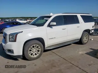 2019 GMC Yukon XL SLT with VIN 1GKS2GKC5KR363643, listed as a Copart auction lot 52749525 with 92,872 mi miles and Salvage title. Bid and sale history available at DreamBid. Image 1.