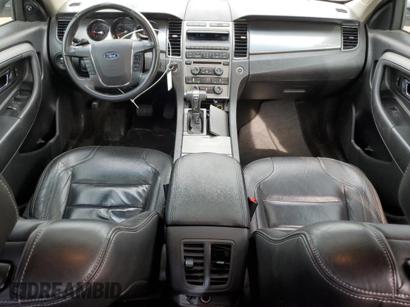 2012 Ford Taurus SEL z VIN 1FAHP2EW8CG138653, wystawiony jako Copart lot #56750215 z przebiegiem 159 631 mil mil oraz Szkoda całkowita • Salvage title. Historia ofert i sprzedaży dostępna na DreamBid. Obrazek 8.
