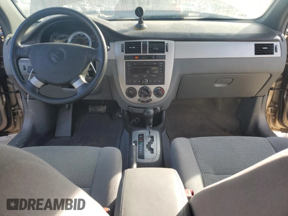 2008 Suzuki Forenza z VIN KL5JD56Z08K908143, wystawiony jako Copart lot #42985685 z przebiegiem 57 435 mil mil oraz Szkoda całkowita • Salvage title. Historia ofert i sprzedaży dostępna na DreamBid. Obrazek 8.