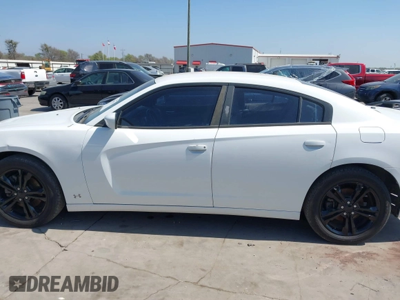 2011 Dodge Charger RT Plus with VIN 2B3CM5CT9BH591577, listed as a IAAI auction lot 41804275 with 126,750 mi miles. Bid and sale history available at carsss.com. Image 14.