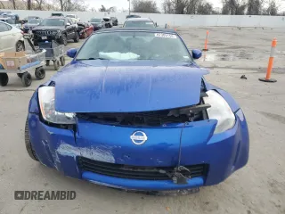 2004 Nissan 350Z Touring with VIN JN1AZ36A24T002058, listed as a Copart auction lot 87305154 with 61,000 mi miles and Salvage Title. Bid and sale history available at carsss.com. Image 5.