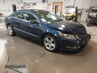 2013 Volkswagen CC Sport Plus z VIN WVWBP7AN0DE571231, wystawiony jako IAAI lot #41363748 z przebiegiem 117 522 mil mil oraz . Historia ofert i sprzedaży dostępna na DreamBid. Obrazek 1.