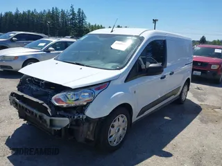 2018 Ford Transit Connect XLT z VIN NM0LS7F71J1372251, wystawiony jako IAAI lot #42630651 z przebiegiem 75 072 mil mil oraz . Historia ofert i sprzedaży dostępna na DreamBid. Obrazek 2.