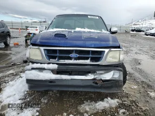 1997 Ford F-150 XL with VIN 1FTEX17LXVKB44786, listed as a Copart auction lot 49630955 with 301,736 mi miles and Salvage title. Bid and sale history available at DreamBid. Image 5.