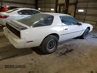 1984 Pontiac Firebird z VIN 1G2AS87H8EL260830, wystawiony jako Copart lot #84198714 z przebiegiem 95 966 mil mil oraz Szkoda całkowita • Salvage title. Historia ofert i sprzedaży dostępna na DreamBid. Obrazek 3.