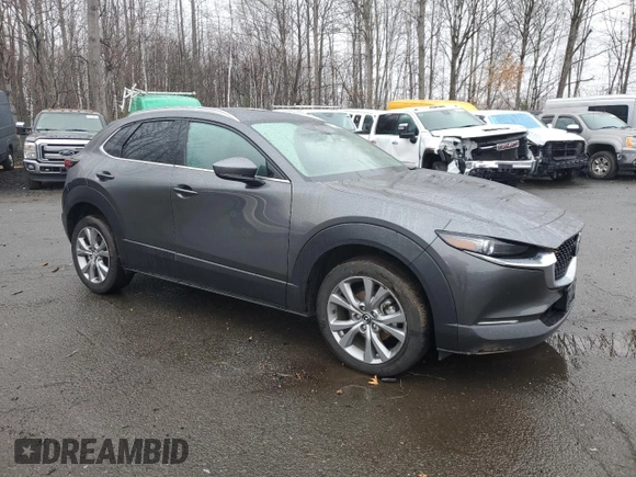 2022 Mazda CX-30 S Premium with VIN 3MVDMBDLXNM445466, listed as a Copart auction lot 51820105 with 65,417 mi miles and Salvage title. Bid and sale history available at DreamBid. Image 4.