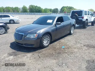 2014 Chrysler 300 with VIN 2C3CCAAG3EH237157, listed as a IAAI auction lot 41986053 with 61,372 mi miles and . Bid and sale history available at DreamBid. Image 2.
