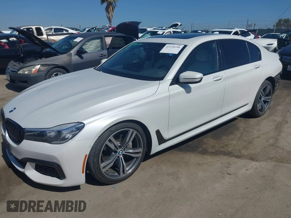 2019 BMW 7 Series 740i with VIN WBA7E2C53KB454816, listed as a IAAI auction lot 42539294 with 73,363 mi miles and . Bid and sale history available at DreamBid. Image 18.