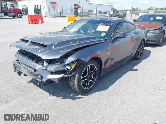 2015 Ford Mustang GT z VIN 1FA6P8CFXF5368661, wystawiony jako IAAI lot #42442905 z przebiegiem 117 064 mil mil oraz . Historia ofert i sprzedaży dostępna na DreamBid. Obrazek 2.