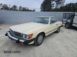 1987 Mercedes-Benz 560 SL with VIN WDBBA48D5HA061899, listed as a Copart auction lot 87742235 with 68,292 mi miles and Salvage Title. Bid and sale history available at DreamBid. Image 2.