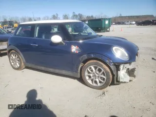 2014 MINI Hardtop with VIN WMWXM5C56ET972955, listed as a Copart auction lot 48160225 with 60,692 mi miles and Clean Title. Bid and sale history available at DreamBid. Image 4.