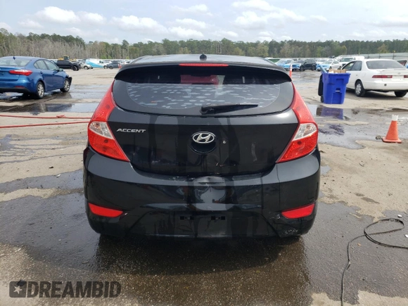 2014 Hyundai Accent SE z VIN KMHCU5AE2EU164130, wystawiony jako Copart lot #50972055 z przebiegiem 113 834 mil mil oraz Szkoda całkowita • Salvage title. Historia ofert i sprzedaży dostępna na DreamBid. Obrazek 6.