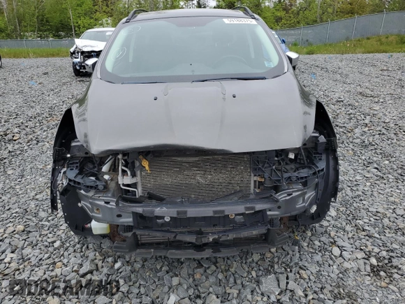2016 Ford Escape SE z VIN 1FMCU9G96GUB76771, wystawiony jako Copart lot #59188375 z przebiegiem 167 300 mil mil oraz Szkoda całkowita • Salvage title. Historia ofert i sprzedaży dostępna na DreamBid. Obrazek 5.