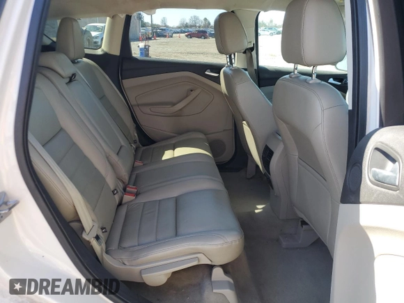 2016 Ford Escape Titanium with VIN 1FMCU9J95GUC74411, listed as a Copart auction lot 50061075 with 198,865 mi miles and Salvage Title. Bid and sale history available at DreamBid. Image 12.