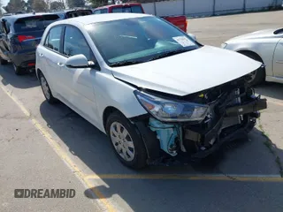 2023 Kia Rio S with VIN 3KPA25AD0PE629868, listed as a IAAI auction lot 41738952 with 25,642 mi miles and . Bid and sale history available at DreamBid. Image 1.