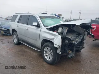 2016 GMC Yukon SLT with VIN 1GKS1BKC6GR137074, listed as a IAAI auction lot 41449711 with 171,118 mi miles. Bid and sale history available at carsss.com. Image 1.