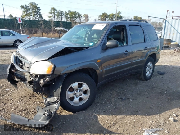 2004 Mazda Tribute LX with VIN 4F2CZ941X4KM19302, listed as a IAAI auction lot 41791389 with 123,036 mi miles. Bid and sale history available at carsss.com. Image 2.