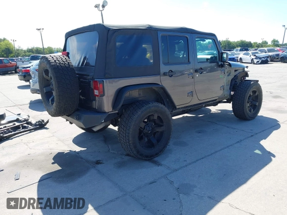 2014 Jeep Wrangler Unlimited Sport with VIN 1C4BJWDG4EL295044, listed as a IAAI auction lot 41997837 with 143,447 mi miles. Bid and sale history available at carsss.com. Image 4.