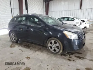 2009 Pontiac Vibe z VIN 5Y2SM67099Z410763, wystawiony jako Copart lot #57608015 z przebiegiem 172 308 mil mil oraz Tytuł czysty. Historia ofert i sprzedaży dostępna na DreamBid. Obrazek 4.