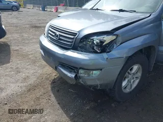 2005 Lexus GX 470 with VIN JTJBT20X650076318, listed as a IAAI auction lot 41896094 with 221,348 mi miles and . Bid and sale history available at DreamBid. Image 6.
