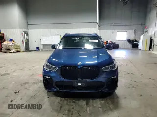 2021 BMW X5 xDrive45e z VIN 5UXTA6C07M9H87685, wystawiony jako Copart lot #54844365 z przebiegiem 61 969 mil mil oraz Szkoda całkowita • Salvage title. Historia ofert i sprzedaży dostępna na DreamBid. Obrazek 14.
