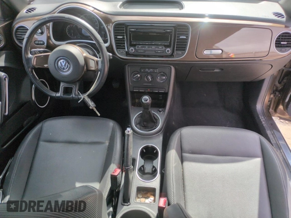 2013 Volkswagen Beetle with VIN 3VWHX7AT8DM603424, listed as a Copart auction lot 51019185 with 136,196 mi miles and Salvage Title. Bid and sale history available at DreamBid. Image 8.