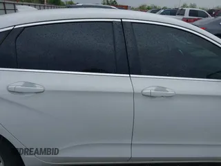 2017 Chevrolet Impala LT with VIN 2G1105SA7H9153475, listed as a IAAI auction lot 41896532 with 112,012 mi miles and . Bid and sale history available at DreamBid. Image 13.