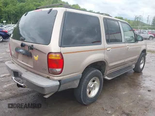 1998 Ford Explorer XL z VIN 1FMZU34E5WZA20652, wystawiony jako IAAI lot #42363619 z przebiegiem 383 213 mil mil oraz . Historia ofert i sprzedaży dostępna na DreamBid. Obrazek 4.