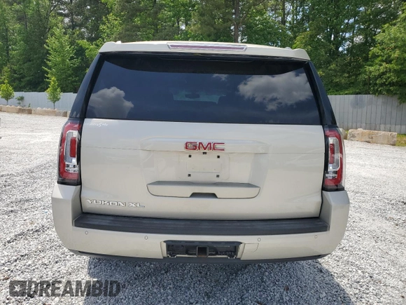 2015 GMC Yukon XL SLE z VIN 1GKS1GKC6FR203201, wystawiony jako Copart lot #53888885 z przebiegiem 202 601 mil mil oraz Szkoda całkowita • Salvage title. Historia ofert i sprzedaży dostępna na DreamBid. Obrazek 6.