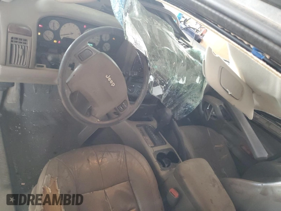 2002 Jeep Grand Cherokee Limited with VIN 1J8GX58N72C294837, listed as a Copart auction lot 56201145 with 218,345 mi miles and Salvage Title. Bid and sale history available at DreamBid. Image 8.