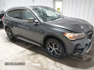 2018 BMW X1 xDrive28i with VIN WBXHT3C38J5L34625, listed as a IAAI auction lot 41133876 with 60,986 mi miles and . Bid and sale history available at DreamBid. Image 1.