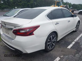 2017 Nissan Altima SR z VIN 1N4AL3AP3HC271465, wystawiony jako IAAI lot #42716097 z przebiegiem 159 349 mil mil oraz . Historia ofert i sprzedaży dostępna na DreamBid. Obrazek 4.