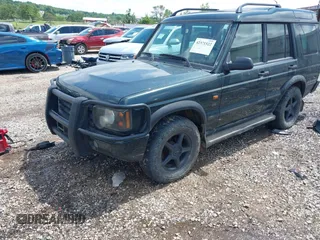 2003 Land Rover Discovery z VIN SALTY164X3A799072, wystawiony jako IAAI lot #42371522 z przebiegiem 106 157 mil mil oraz . Historia ofert i sprzedaży dostępna na DreamBid. Obrazek 6.