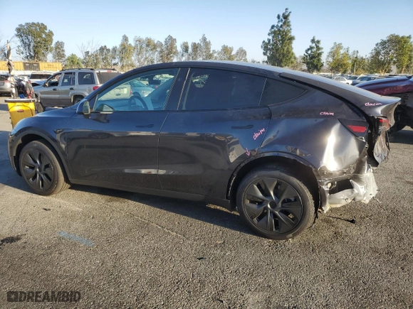 2024 Tesla Model Y with VIN 7SAYGDED2RF200414, listed as a Copart auction lot 88920875 with 2,420 mi miles and Salvage Title. Bid and sale history available at carsss.com. Image 2.