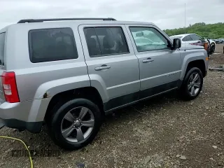 2015 Jeep Patriot High Altitude with VIN 1C4NJRFB2FD396806, listed as a Copart auction lot 57651155 with 130,357 mi miles and Salvage title. Bid and sale history available at DreamBid. Image 14.