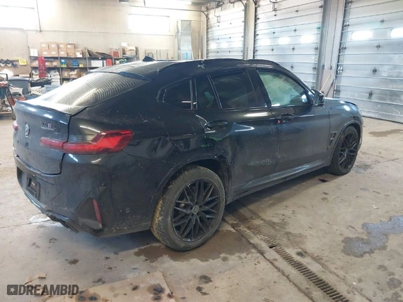 2023 BMW X4 M with VIN 5YM23EC05P9R57259, listed as a IAAI auction lot 41003784 with 33,928 mi miles. Bid and sale history available at carsss.com. Image 4.