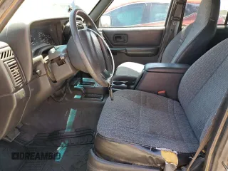 2000 Jeep Cherokee with VIN 1J4FF48S6YL136689, listed as a Copart auction lot 62316245 with 211,100 mi miles and Clean title. Bid and sale history available at DreamBid. Image 7.