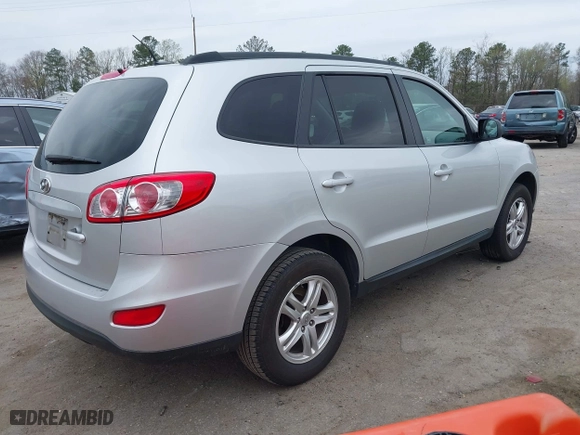 2012 Hyundai Santa Fe GLS with VIN 5XYZG3AB3CG124427, listed as a IAAI auction lot 41953057 with 156,413 mi miles. Bid and sale history available at carsss.com. Image 4.