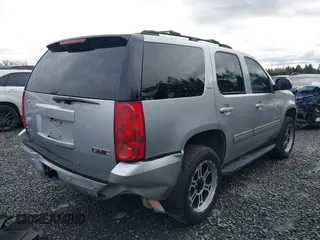 2012 GMC Yukon SLT with VIN 1GKS2CE03CR324366, listed as a IAAI auction lot 41473131 with 161,847 mi miles. Bid and sale history available at carsss.com. Image 4.