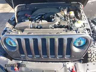2020 Jeep Wrangler Unlimited Rubicon with VIN 1C4HJXFG3LW291155, listed as a IAAI auction lot 41348485 with 72,481 mi miles and . Bid and sale history available at DreamBid. Image 10.