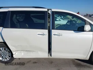 2016 Toyota Sienna XLE with VIN 5TDYK3DC6GS758189, listed as a IAAI auction lot 41598251 with 129,050 mi miles and . Bid and sale history available at DreamBid. Image 13.
