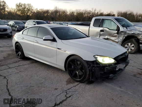2014 BMW 6 Series 650i z VIN WBA6B2C54ED128858, wystawiony jako Copart lot #79132084 z przebiegiem 29 244 mil mil oraz Szkoda całkowita • Salvage title. Historia ofert i sprzedaży dostępna na DreamBid. Obrazek 4.