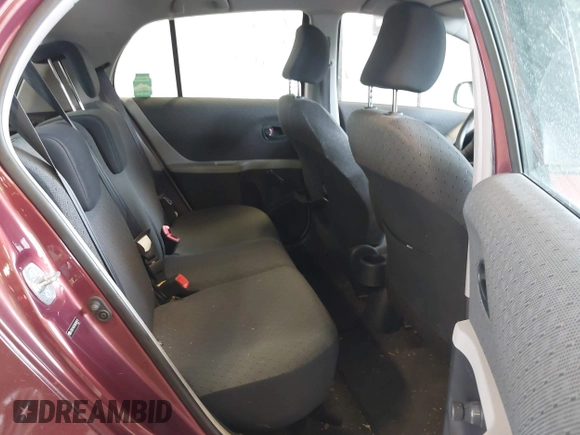 2010 Toyota Yaris z VIN JTDKT4K37A5289171, wystawiony jako IAAI lot #42436707 z przebiegiem 118 810 mil mil oraz . Historia ofert i sprzedaży dostępna na DreamBid. Obrazek 8.