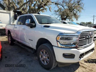 2023 Ram 2500 Laramie with VIN 3C6UR5FJ4PG569029, listed as a Copart auction lot 80959124 with Not provided miles and Salvage title. Bid and sale history available at DreamBid. Image 4.