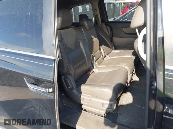 2012 Honda Odyssey EX-L z VIN 5FNRL5H63CB046447, wystawiony jako IAAI lot #42578775 z przebiegiem 247 852 mil mil oraz . Historia ofert i sprzedaży dostępna na DreamBid. Obrazek 8.