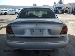 2002 Saturn SL with VIN 1G8ZH52882Z177307, listed as a Copart auction lot 59407345 with 63,864 mi miles and Clean title. Bid and sale history available at DreamBid. Image 6.