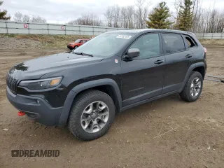 2019 Jeep Cherokee Trailhawk with VIN 1C4PJMBX7KD341534, listed as a Copart auction lot 52352765 with 207,532 mi miles and Salvage Title. Bid and sale history available at DreamBid. Image 1.