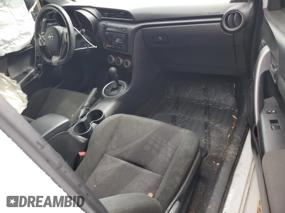 2012 Scion tC z VIN JTKJF5C71C3032427, wystawiony jako Copart lot #54160695 z przebiegiem 59 826 mil mil oraz Szkoda całkowita • Salvage title. Historia ofert i sprzedaży dostępna na DreamBid. Obrazek 8.