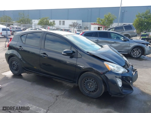 2015 Toyota Prius c One with VIN JTDKDTB3XF1585940, listed as a IAAI auction lot 41263863 with 267,841 mi miles. Bid and sale history available at carsss.com. Image 1.